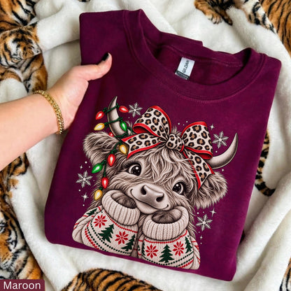 Christmas Highland Cow T-Shirt Sweatshirt Hoodie – Cute Fluffy Cow Leopard Bow Christmas Lights Holiday Graphic Apparel